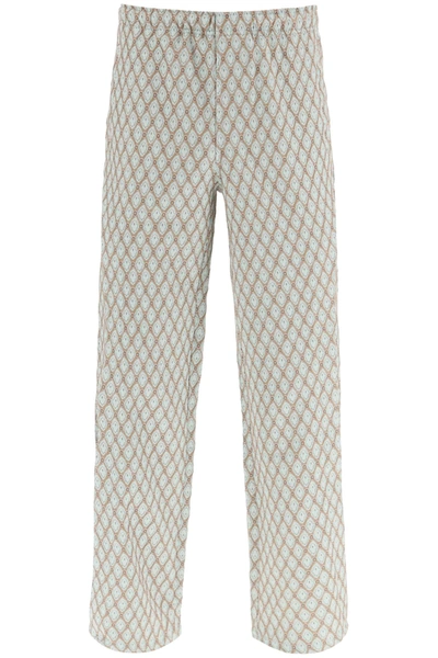 Andersson Bell Beige Trousers With Jacquard Pattern And Overlays In Mixed Colours
