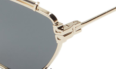Shop Tory Burch 55mm Oval Sunglasses In Gold