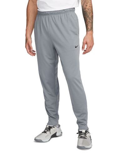 Shop Nike Men's Totality Dri-fit Tapered Versatile Pants In Smoke Grey,black
