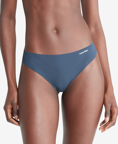 Shop Calvin Klein Women's Invisibles Thong Underwear D3428 In Smudge Green