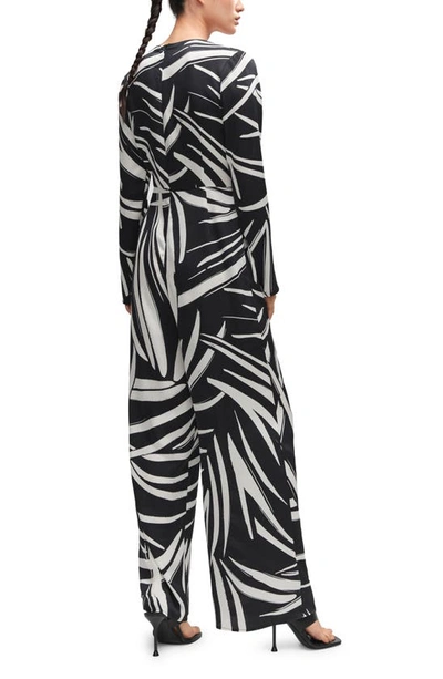 Shop Mango Abstract Print Long Sleeve Wrap Jumpsuit In Black