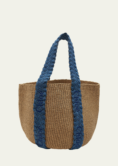 Shop Chloé Woody Woven Paper Shoulder Bag In 45d Denim