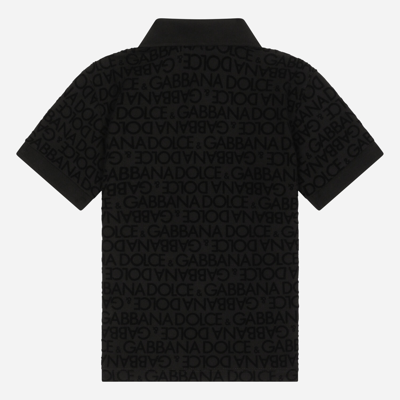 Shop Dolce & Gabbana Short-sleeved Polo-shirt With Flocked Print In Black
