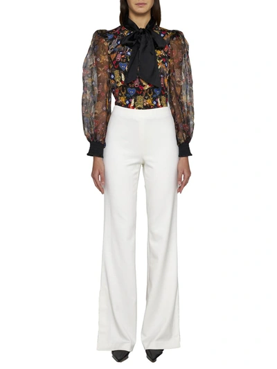 Shop Alice And Olivia Alice + Olivia Trousers In Beige