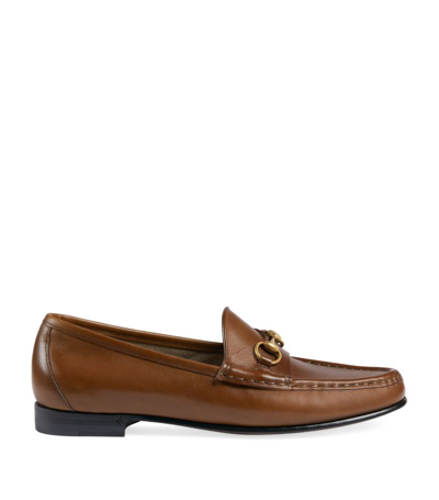 Shop Gucci Leather 1953 Horsebit Loafers In Brown
