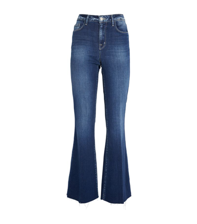 Shop L Agence Sera Stretch Flared Jeans In Blue