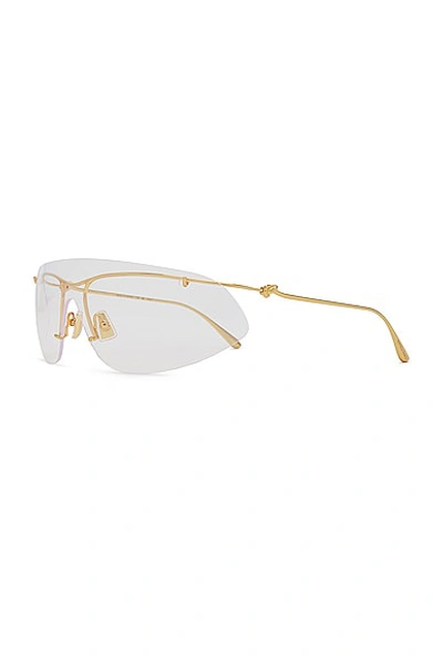 Shop Bottega Veneta Knot Sunglasses In Shiny Gold & Clear