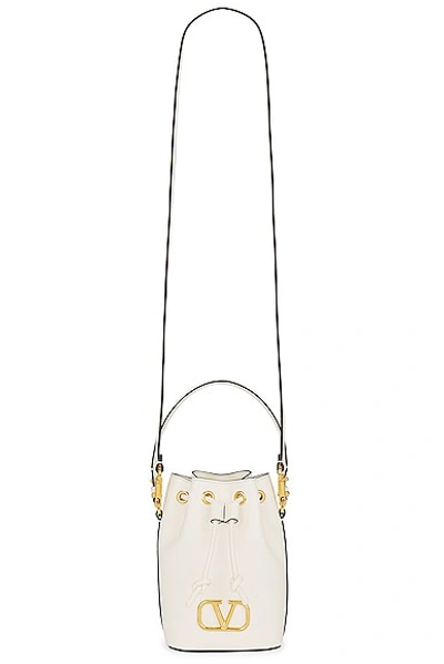 Shop Valentino V Logo Signature Mini Bucket Bag In Ivory