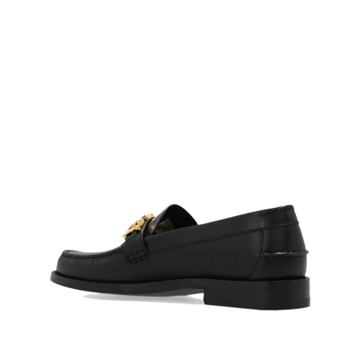 Shop Gucci Logo Plaque Leather Loafers In Black