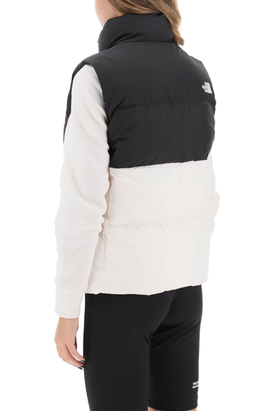 Shop The North Face Saikuru Puffer Vest In Gardenia White Tnf Black (white)