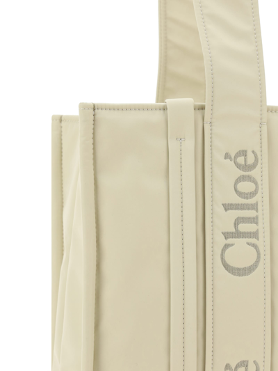 Shop Chloé Woody Handbag In Dusty Ivory