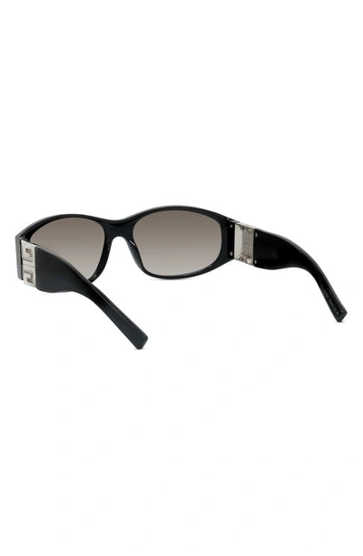 Shop Givenchy 4g Gradient Round Sunglasses In Shiny Black / Gradient Smoke