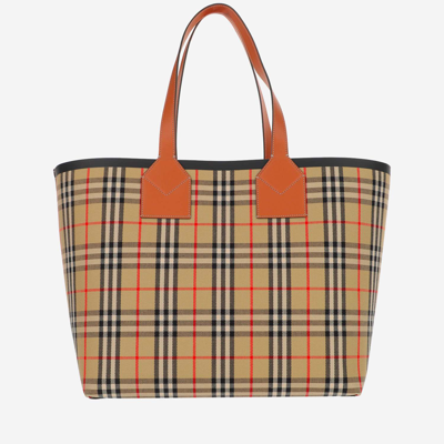 Shop Burberry Cotton Canvas London Tote Bag In Red