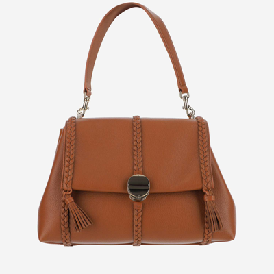 Shop Chloé Medium Penelope Bag In Brown