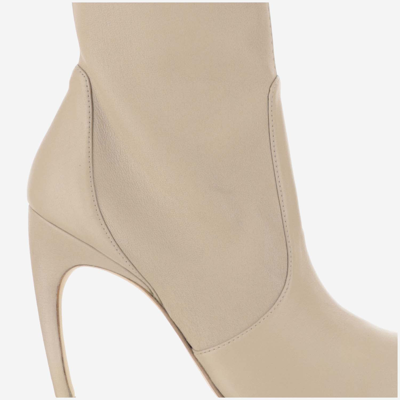 Shop Stuart Weitzman Luxecurve 100mm Ankle Boot In Dune