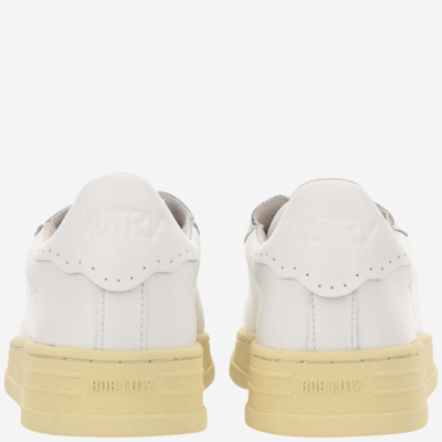 Shop Autry Bob Lutz Leather Sneakers In White