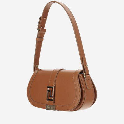 Shop Versace Greca Goddess Mini Leather Bag In Brown