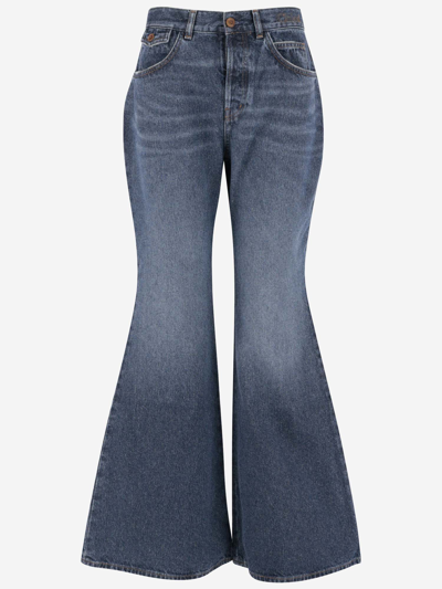 Shop Chloé Flared Jeans In Cotton And Hemp Denim In Faded Denim