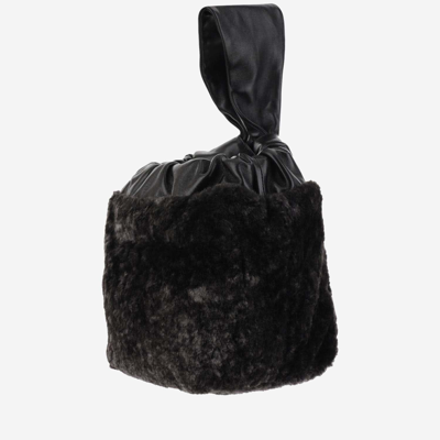 Shop Jil Sander Leather And Shearling Bag In Black