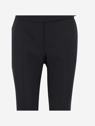 Shop Stella Mccartney Stretch Wool Pants In Black