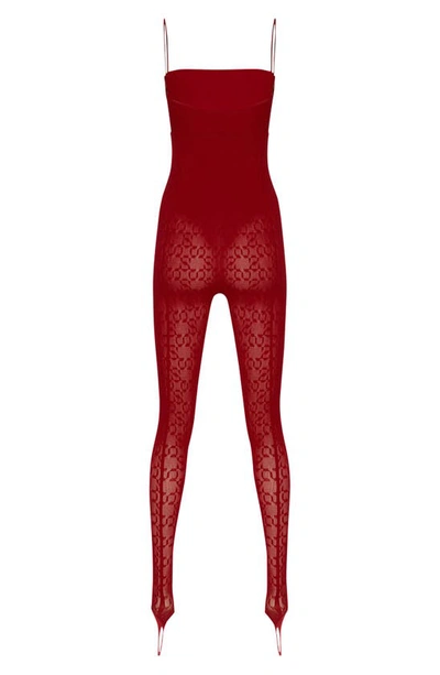 Shop Wolford Intricate Sheer Pattern Thong Stirrup Jumpsuit In Autumn Red
