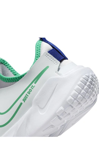 Shop Nike Flex Runner 2 Slip-on Running Shoe In White/ Platinum/ Blue/ Green