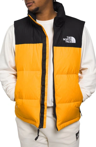 Shop The North Face Nuptse® 1996 Packable Quilted Down Vest In Summit Gold/ Tnf Black