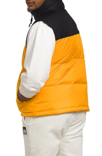 Shop The North Face Nuptse® 1996 Packable Quilted Down Vest In Summit Gold/ Tnf Black
