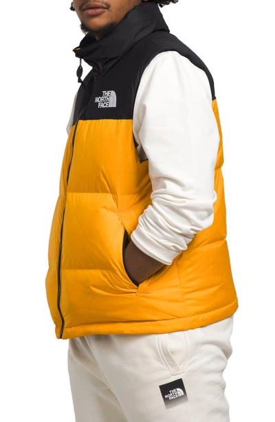 Shop The North Face Nuptse® 1996 Packable Quilted Down Vest In Summit Gold/ Tnf Black