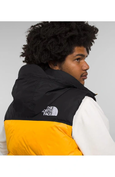 Shop The North Face Nuptse® 1996 Packable Quilted Down Vest In Summit Gold/ Tnf Black