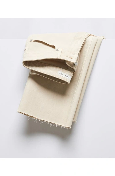 Mango Raw Hem Mid Rise Flare Jeans In Ecru