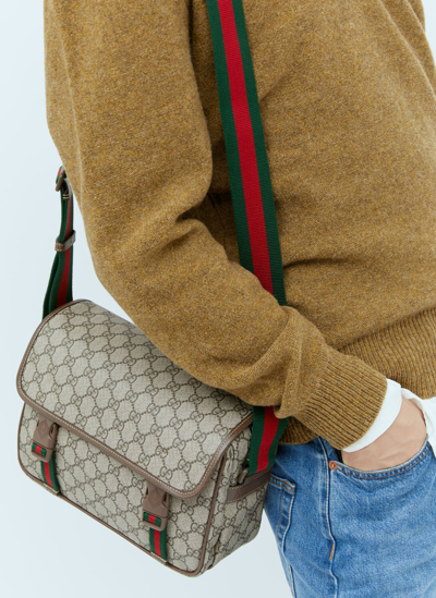 Shop Gucci Gg Messenger Bag In Brown
