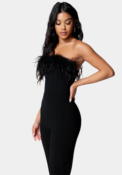 Bebe Feather Trim Split Hem Jumpsuit In Jet Black