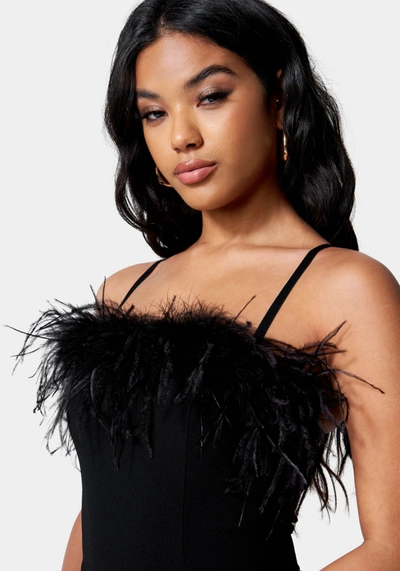 Bebe Feather Trim Split Hem Jumpsuit In Jet Black