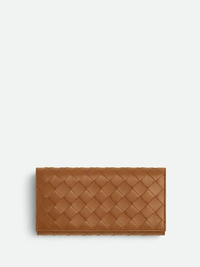 Shop Bottega Veneta Braided Wallet With Large Flap Accessories In Brown