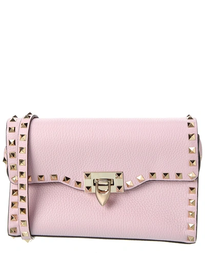 Shop Valentino Rockstud Small Grainy Leather Crossbody In Pink