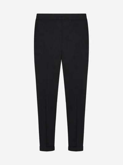 Shop Neil Barrett Lyocell-blend Slim-fit Trousers In Black