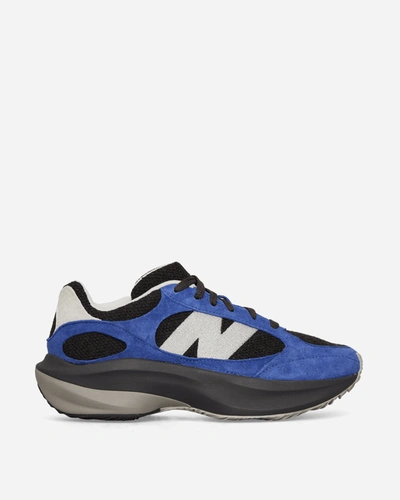 Shop New Balance Wrpd Runner Sneakers Black / Blue In Multicolor
