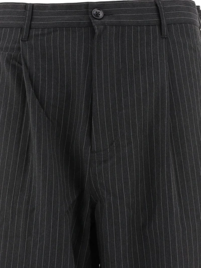 Shop Stussy Stüssy "stripe Volume" Pinstriped Trousers In Black
