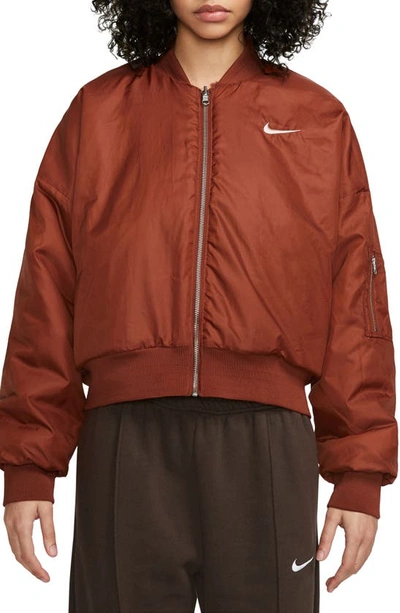 Shop Nike Sportswear Reversible Faux Fur Bomber Jacket In Rugged Orange/ Guava Ice