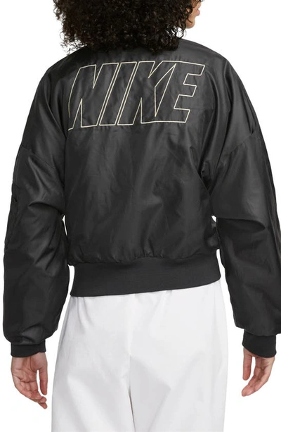Shop Nike Sportswear Reversible Faux Fur Bomber Jacket In Black/ Coconut Milk
