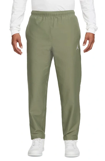 Shop Jordan Essentials Stretch Crop Pants In Sky Light Olive/ White