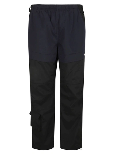 Shop Burberry Beresford Trousers In Black