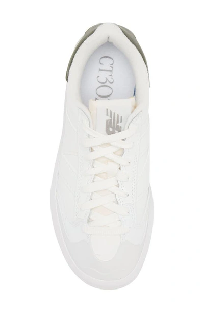 Shop New Balance Gender Inclusive Ct302 Tennis Sneaker In White/ Kombu