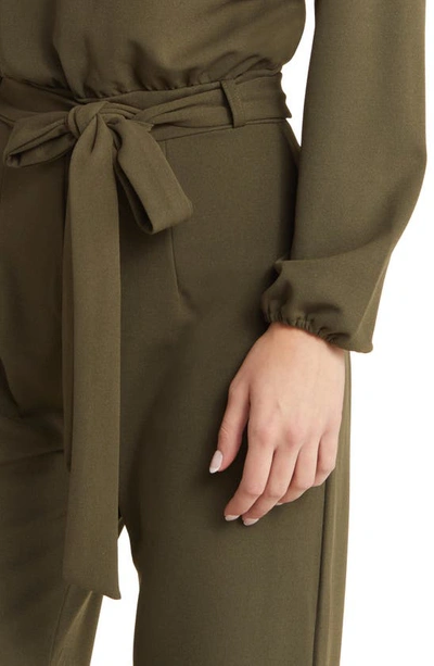 Shop Nikki Lund Joy Long Sleeve Tie Waist Jumpsuit In Olive