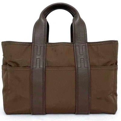 Shop Hermes Acapulco Synthetic Tote Bag () In Brown