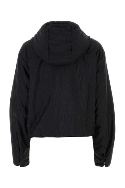 Jil Sander Coats In Black