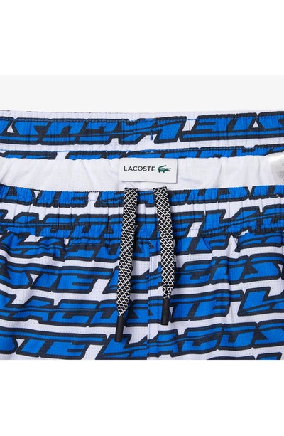 Shop Lacoste Logo Print Cotton Swim Trunks In Any White/ Kingdom