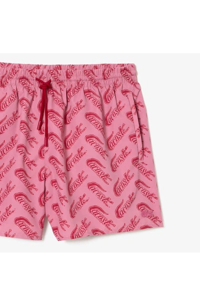 Shop Lacoste Logo Print Cotton Swim Trunks In Ay1 Lighthouse Red/ Reseda