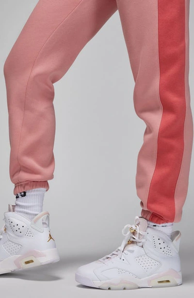 Shop Jordan Brooklyn Fleece Sweatpants In Red Stardust/ Adobe/ White